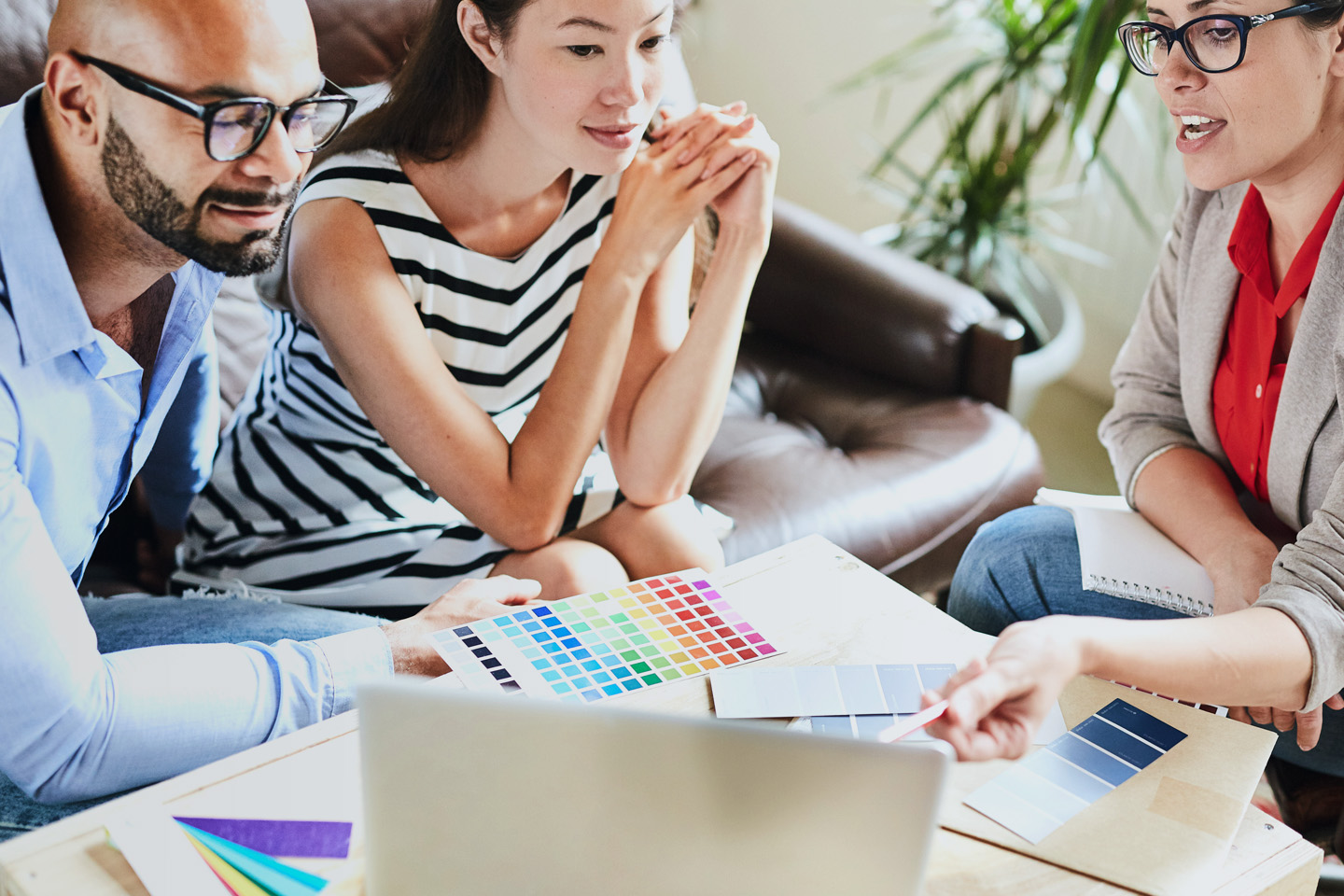 interior-designer-sharing-ideas-clients-boardroom Post-COVID design trends and must-have features for your renovations that appeal to every buyer.