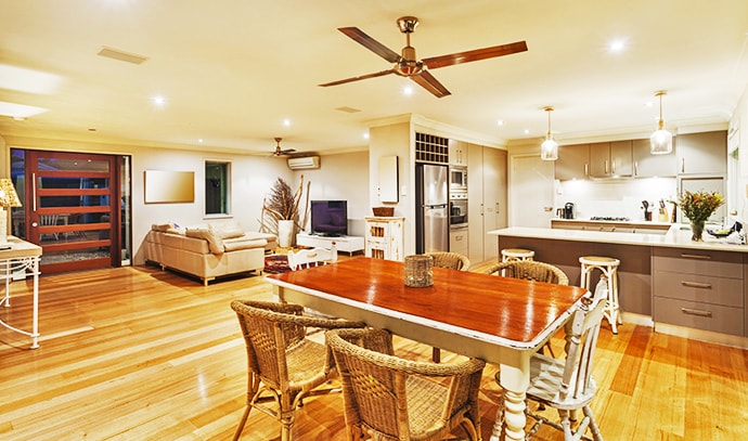 wide-home-dining-area-ceiling-fan-kitchen-yellow-lights
