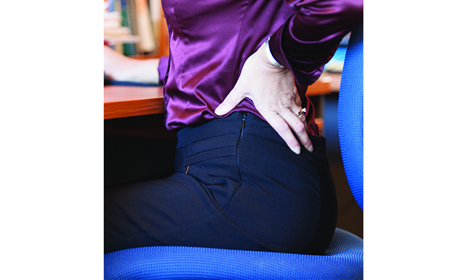 woman-suffers-in-back-pain-while-sitting