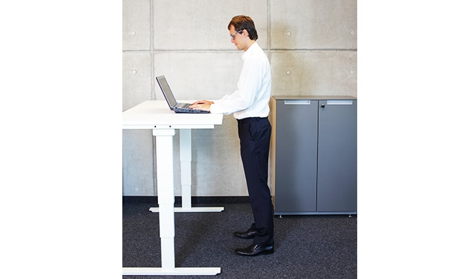 man-working-while-standing