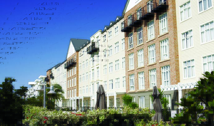 apartment-blocks-bricks-balcony-garden-in-front