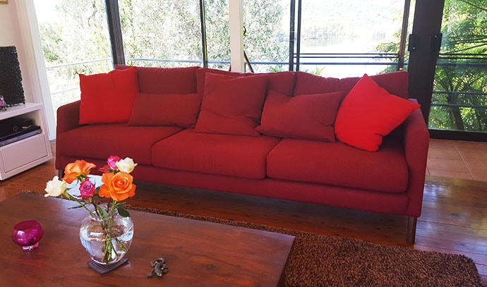 red-long-couch-for-home-lounge-living-room