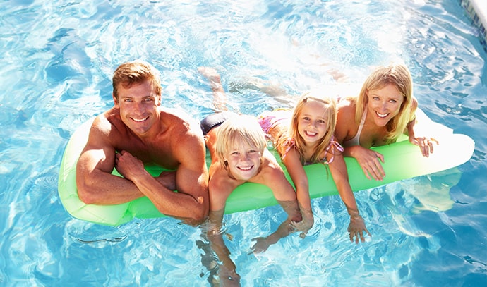 family-spending-quality-time-on-swimming-pool