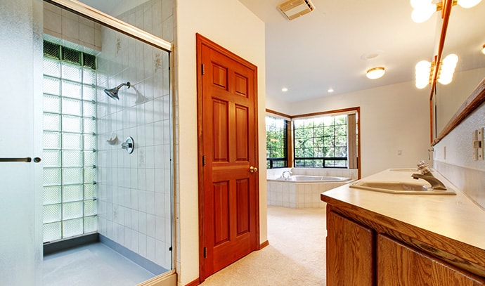 large-white-bathroom-with-shower-cabinet-and-tub
