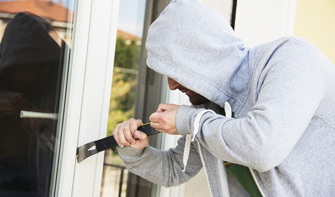 burglar-stealing-house-robbing-home-attempting-theft