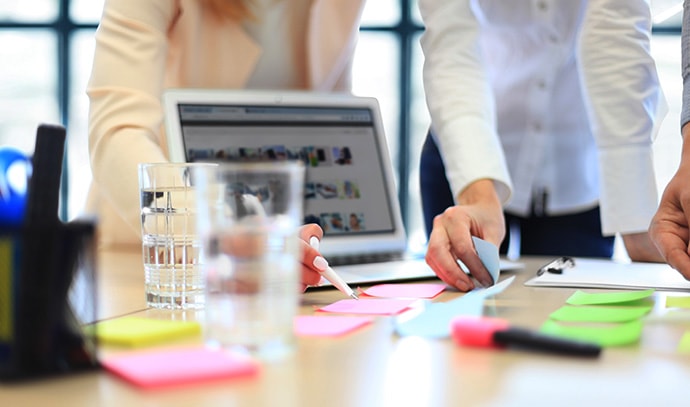 business-people-hands-working-papers-at-meeting