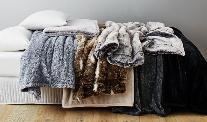 winter-blankets-fur-quilts-white-bed-mattress