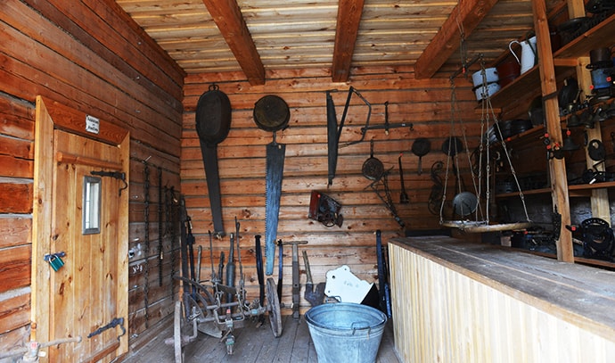 rural-work-tools-hung-walls-barn-construction