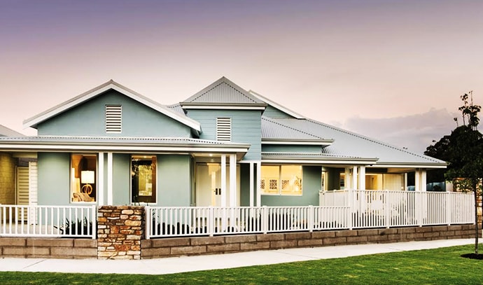 ross-north-homes-teal-suburb-house-fenced-dusk