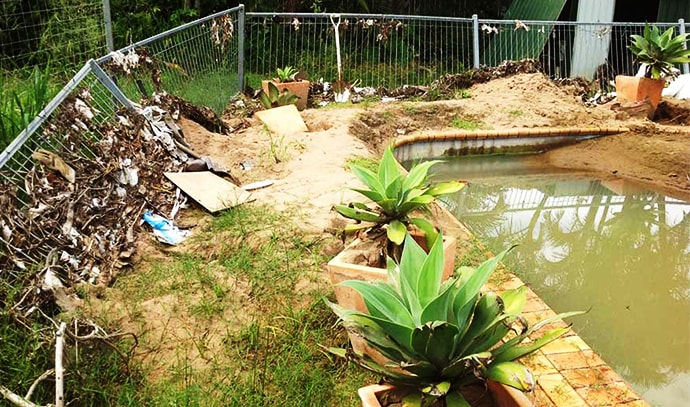 arcbuild-insurance-damaged-pool-wreckage-backyard-soil-dirty-water