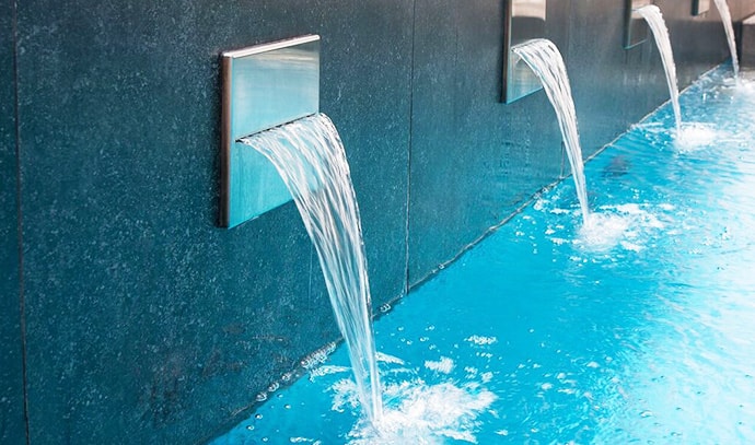 award-pools-swimming-pool-waterfall-blue-accent-tiles