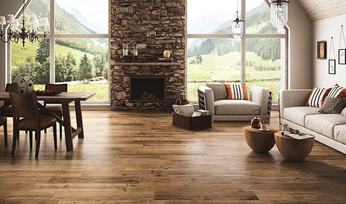 rhone-cru-wooden-tile-floors-living-room-lounge-brick-walls-countryside-mountain-view