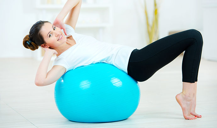 woman-using-inflatable-gym-ball