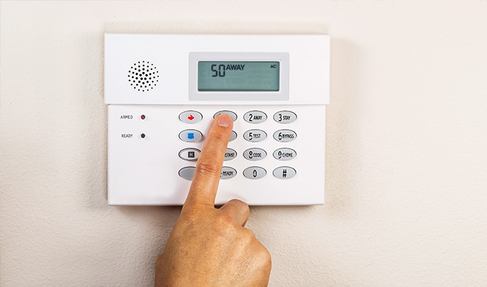 hand-setting-the-away-code-home-alarm-security-panel