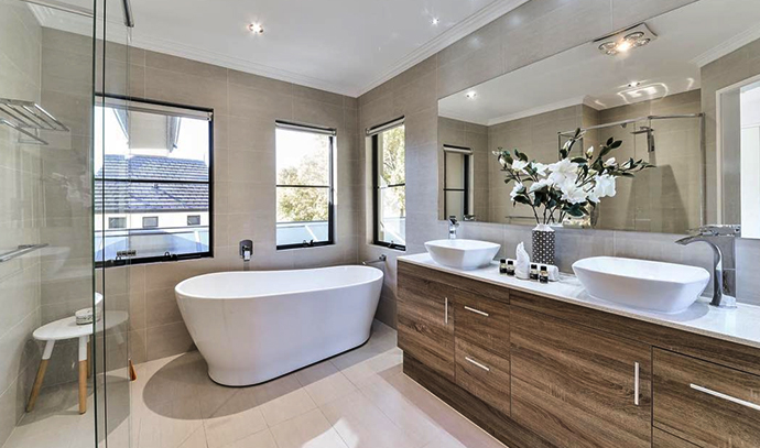 wa-bathrooms-white-bath-tub-wooden-cabinet-bright-lights