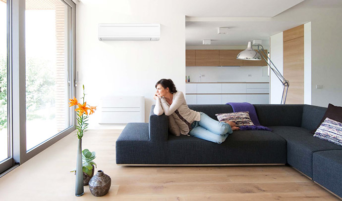 heatshop-com-au-air-conditioned-living-room-couch-woman-sitting
