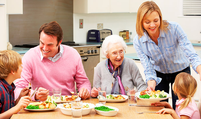 multi-generation-family-sharing-meal-together