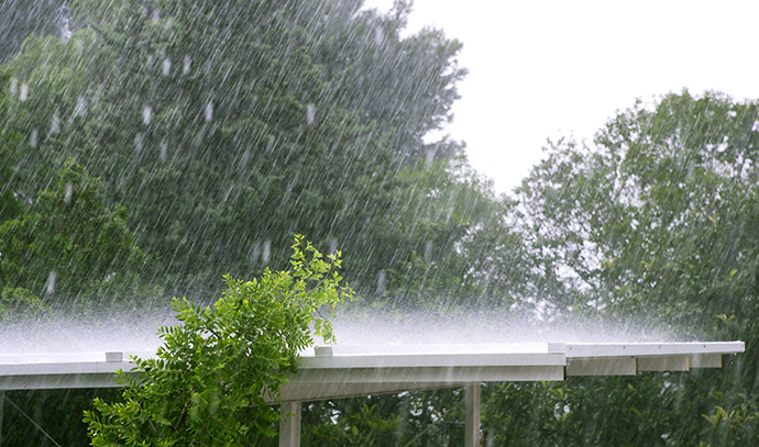 raining-over-white-roof-hurricane-storm