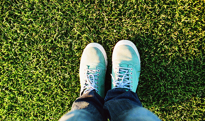 greenacres-foot-shot-standing-backyard-green-lawn
