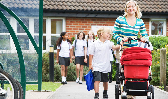 woman-pushchair-stroller-walking-son-home-school