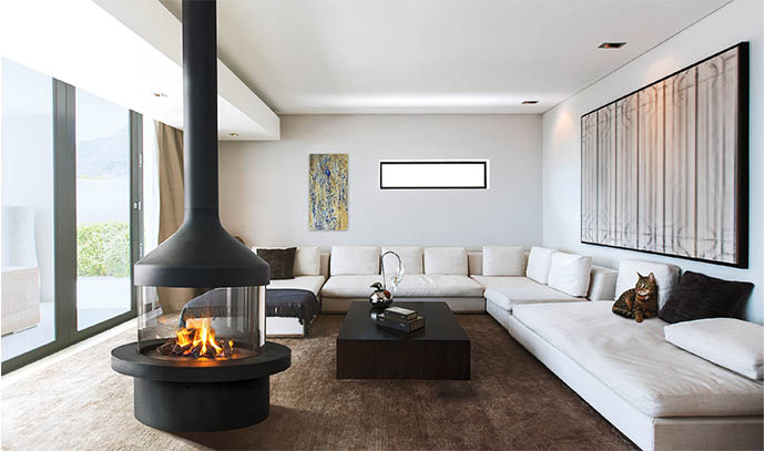 focus-fireplaces-glass-closed-heat-cat-sitting-white-couch-living-room