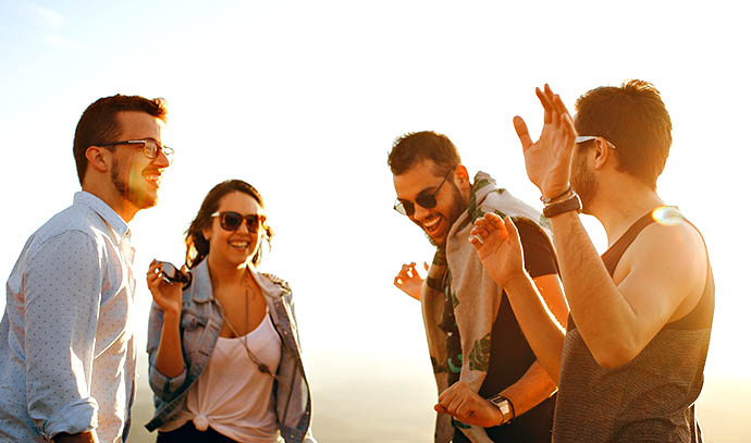 outdoor-happy-group-friends-sunset-summer