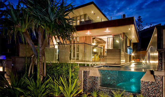 majestic-pools-landscapes-exterior-property-house-night-swimming-pool